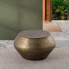 Albany Living T5203 Drum Coffee Table with Storage in Brass finish, showcasing a hammered texture and round design for elegance.