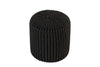 Angled view of a black knitted cotton pouf featuring a textured, handwoven design, ideal for modern seating or decorative accents.