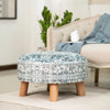 Albany Living 23” Ethnic Stool blue with bamboo legs and blue patterns, adding rustic charm to a cozy living room with a beige sofa