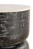 Close-up image of the table's layered design, emphasizing the detailed texture and clean edges of the black surface.