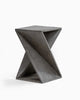 Contemporary gray wooden accent table with a twisted geometric hourglass design, featuring a textured surface and sturdy craftsmanship.