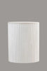 Isolated front view of the table highlighting its vertical ridged texture and pristine white finish.