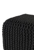 Close-up view of a black knitted cotton cube pouf, highlighting the intricate weave pattern and soft texture for versatile home use.