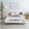 Woman relaxing on a Full Size 10-inch memory foam mattress in a modern bedroom with natural light and decor.