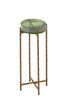 Top angle of the green round accent table showing its detailed tabletop design.