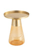 Angled view of the table showing its golden top and transparent amber conical glass base, perfect for modern interiors.