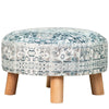 Blue and white patterned upholstered ottoman with wooden legs, designed for both functional seating and stylish home decor.