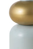 Close-up of a mint-colored accent table featuring a golden sphere accent, highlighting its smooth surface and modern design.