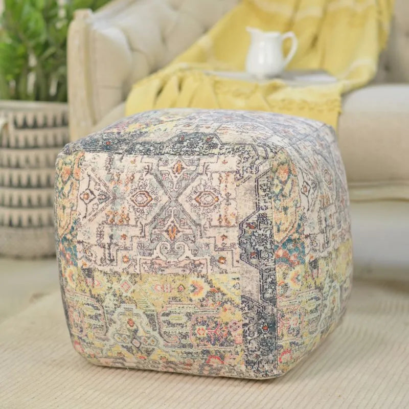 Teal pouf with vintage-inspired patterns, crafted from 100% cotton, offering comfort and a stylish addition to your living space.