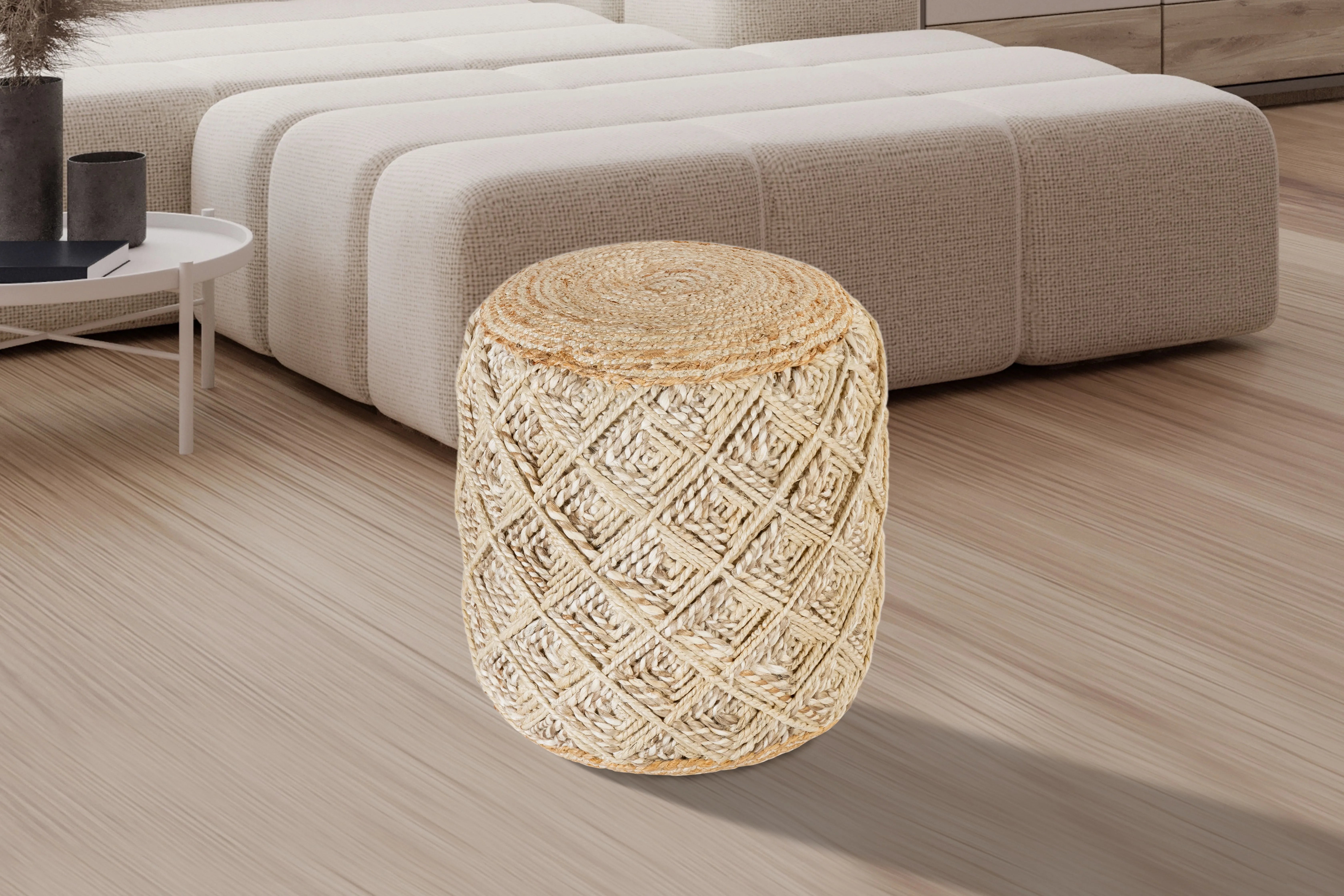 Round woven jute pouf with diamond pattern texture, natural beige color. Perfect for eco-friendly home decor and extra seating.