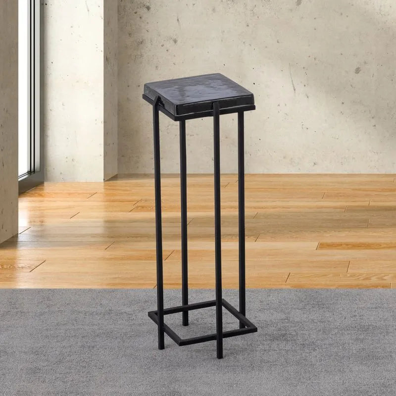 Albany Living T505 Square Casted Glass Drink Table in Smoke finish, featuring a sleek black metal frame and a reflective glass top on light wood flooring.